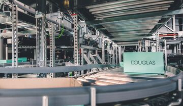 Das Logistikzentrum in Hamm von Douglas und Arvato verdreifacht die Lagerkapazitäten und automatsiert viele Arbeitsschritte.